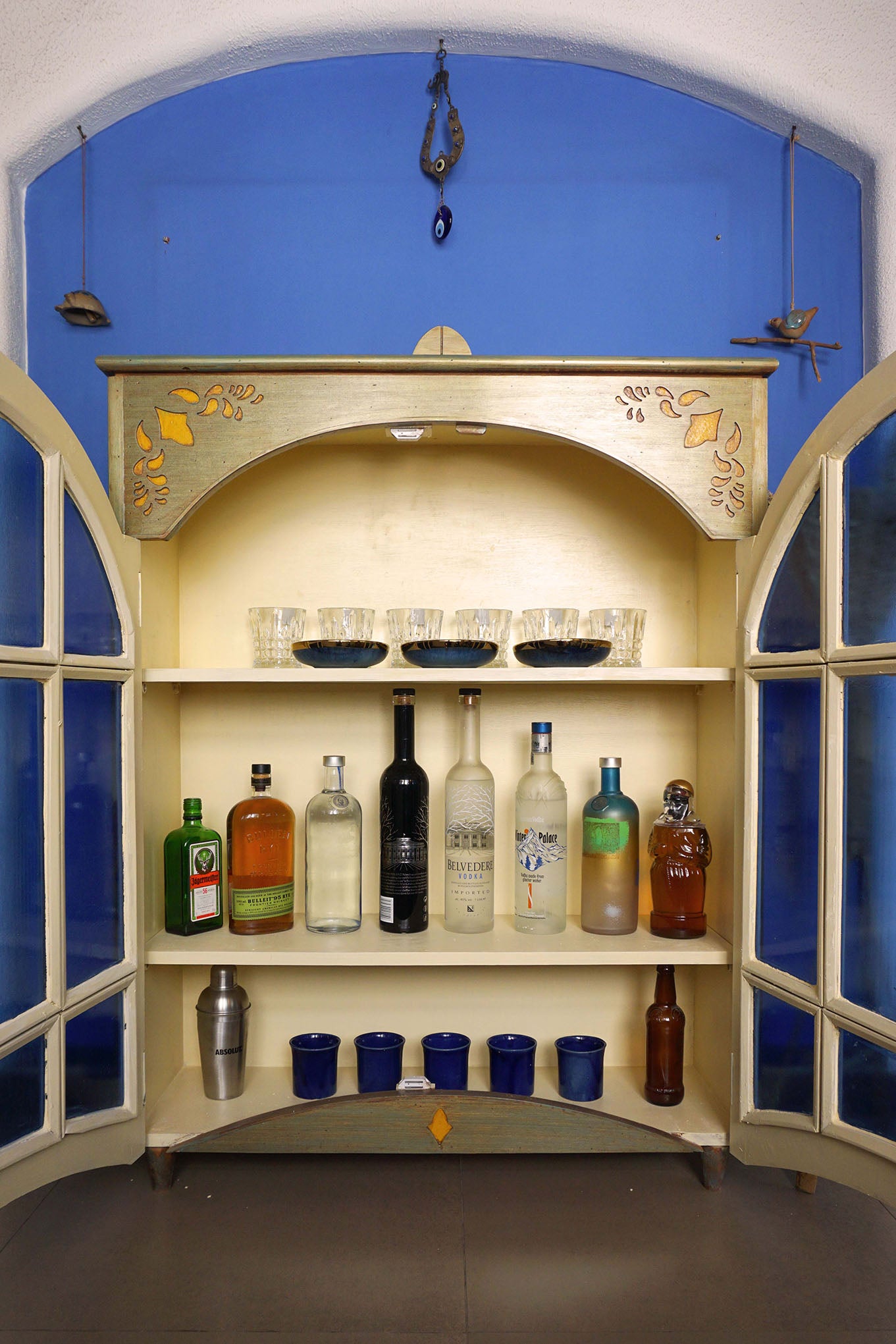 the cabinet with blue glass