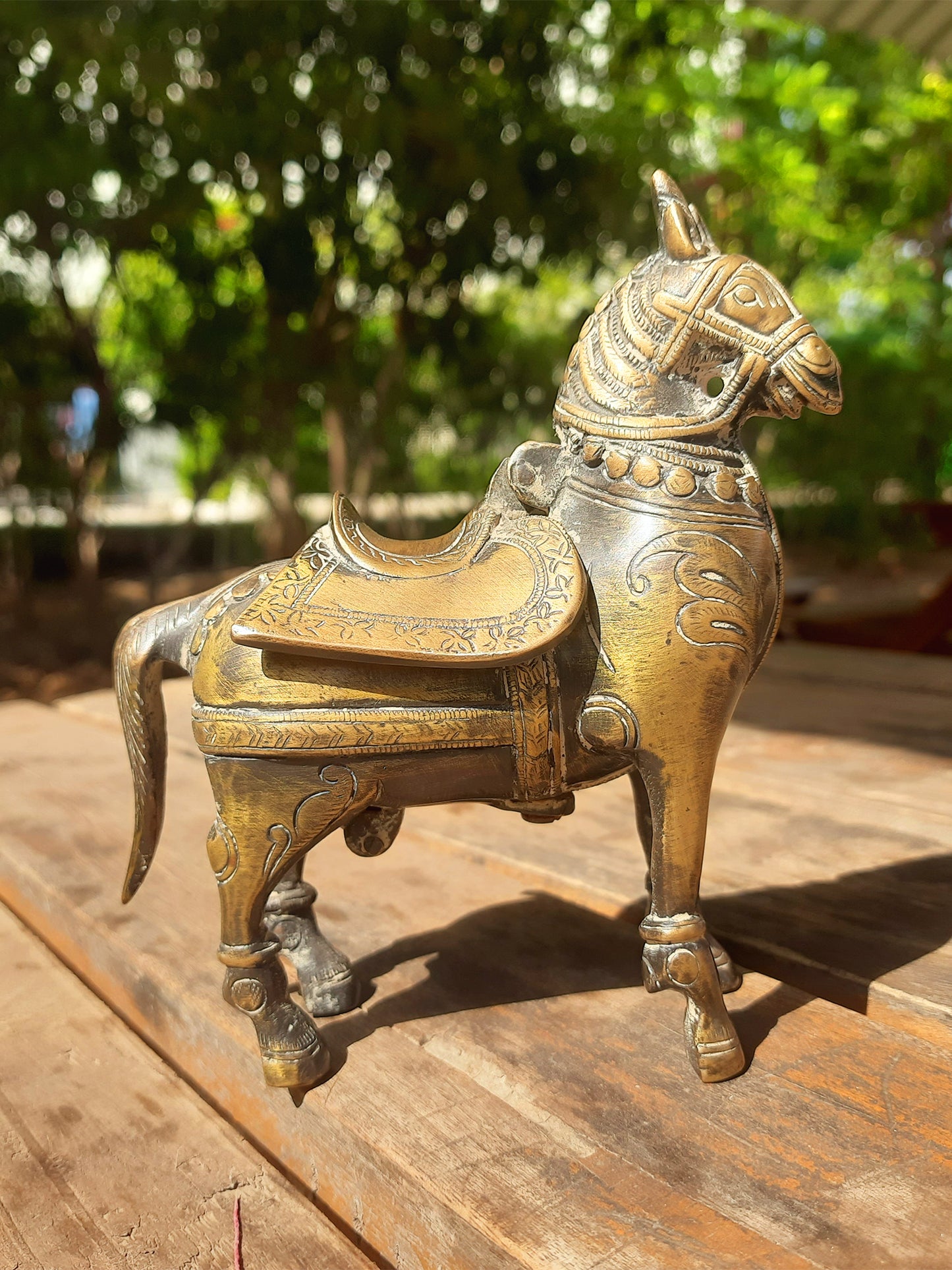 Brass horse with piggybank